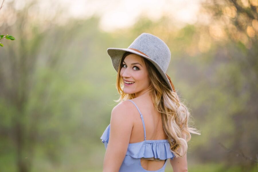 smiling woman with hat